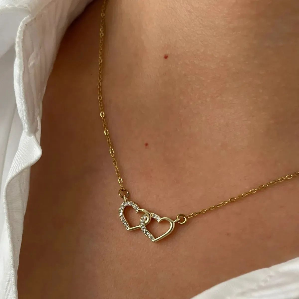 18K Gold-Plated Double Heart Inlaid Zircon Necklace sold by Charming Charlie