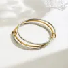 Two-Tone Multi-Layered Bangle Bracelet sold by Charming Charlie