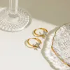 Two-Tone Stainless Steel Star Hoop Earrings sold by Charming Charlie