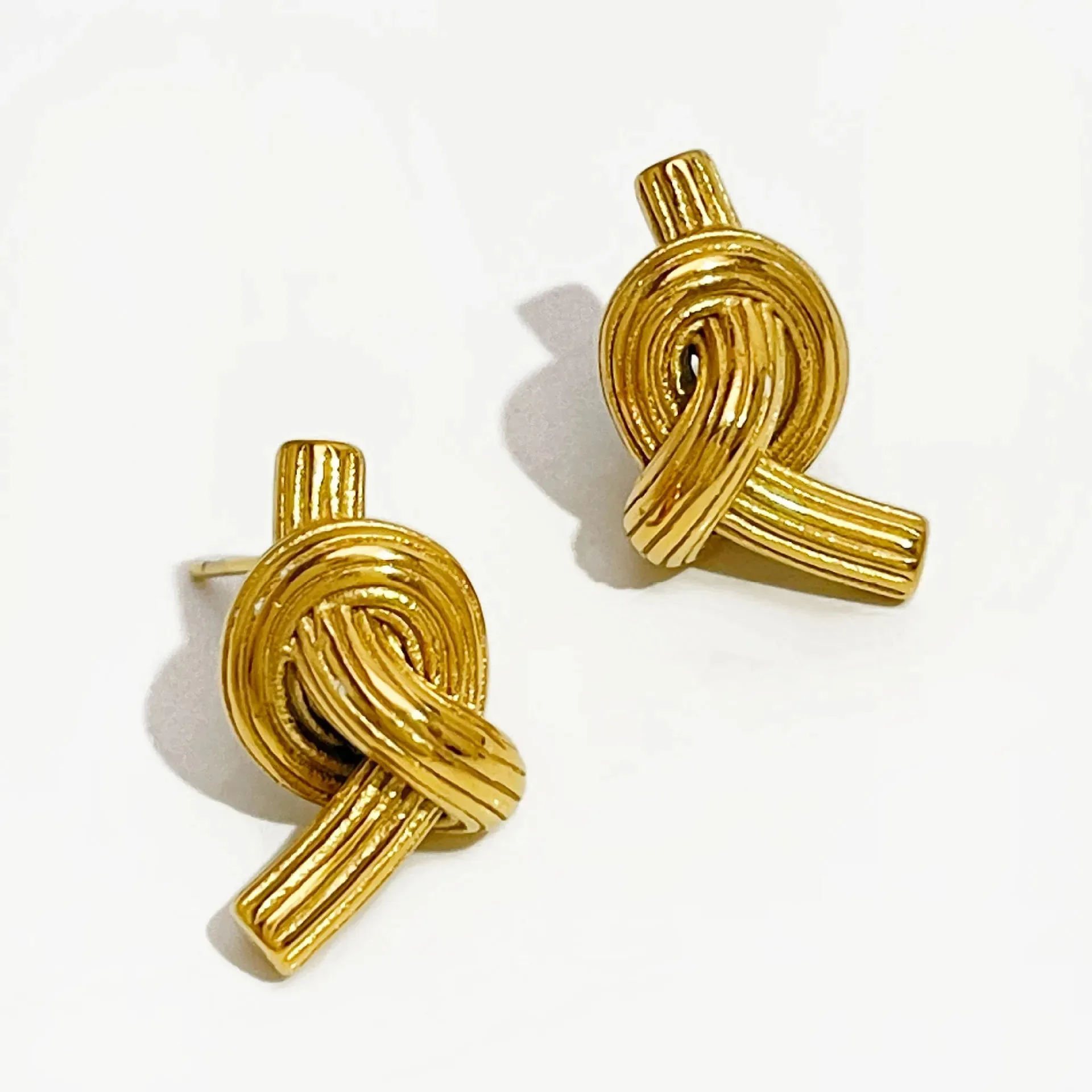 18K Gold-Plated Twisted Knot Stud Earrings sold by Charming Charlie product image thumbnail 5