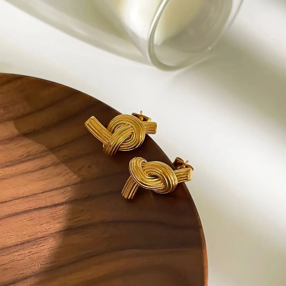 18K Gold-Plated Twisted Knot Stud Earrings sold by Charming Charlie product image thumbnail 3