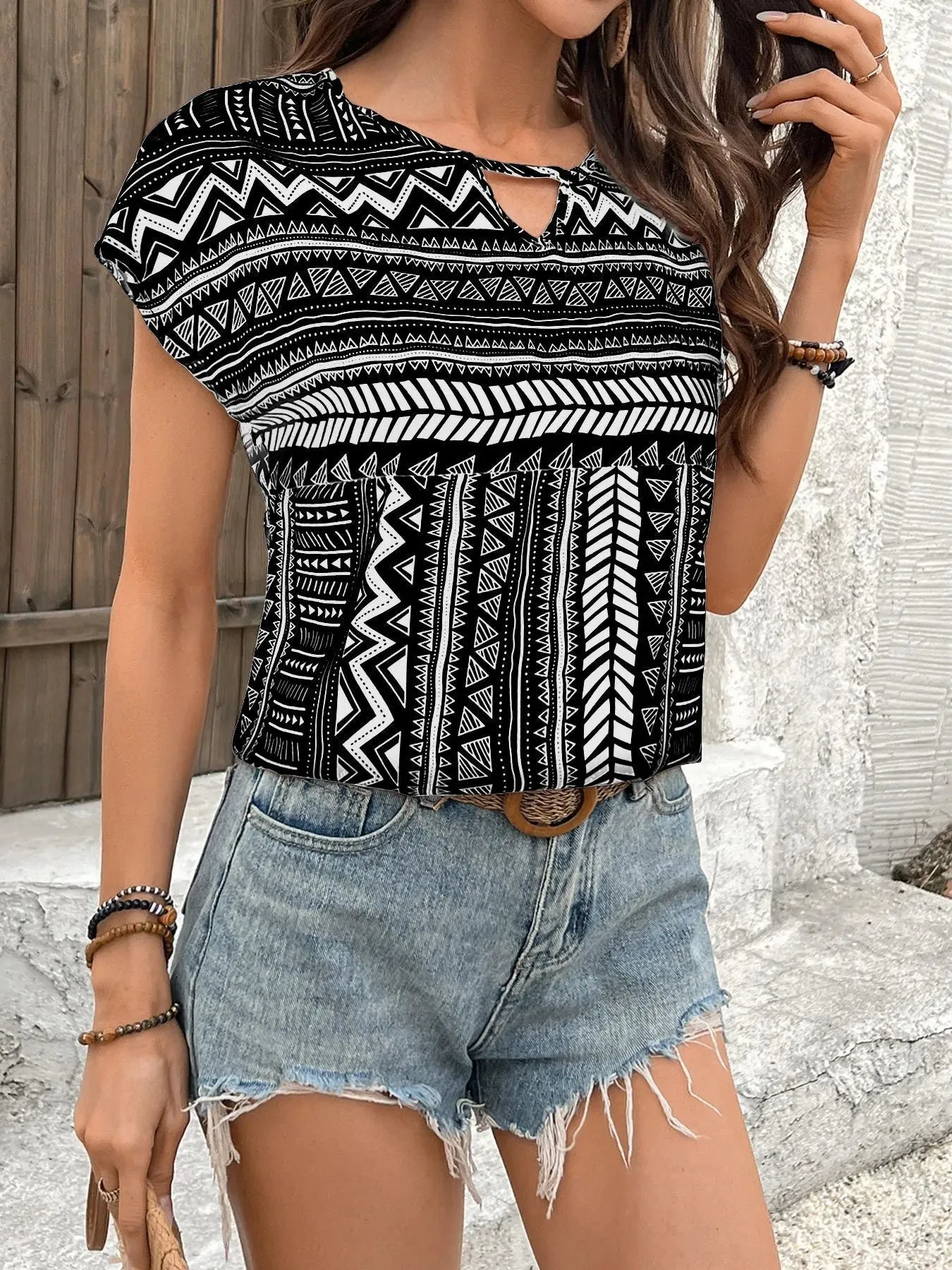 Geometric Print Short Sleeve Blouse sold by Charming Charlie product image thumbnail 3