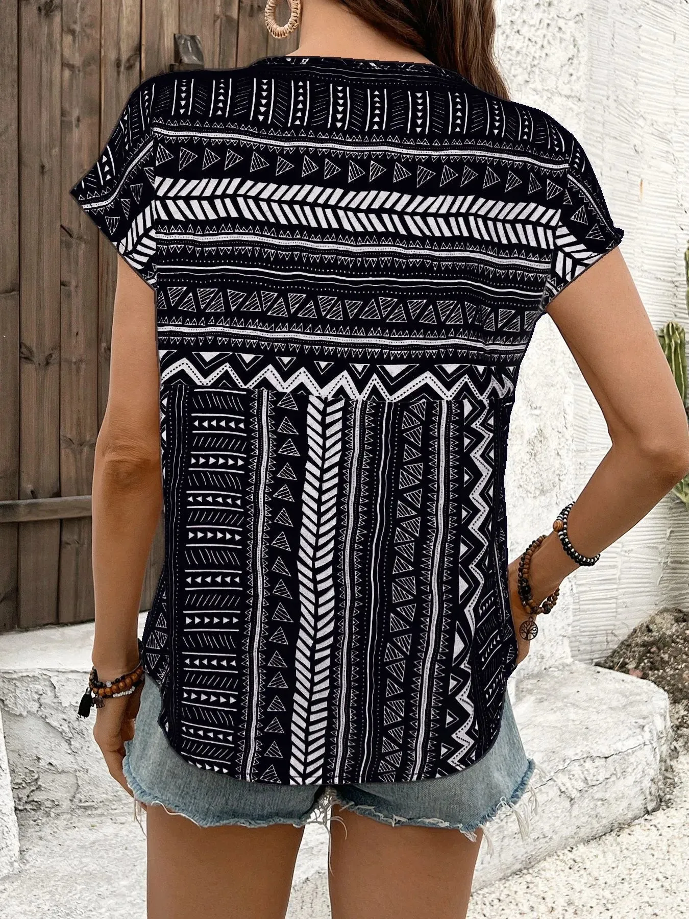 Geometric Print Short Sleeve Blouse sold by Charming Charlie product image thumbnail 5