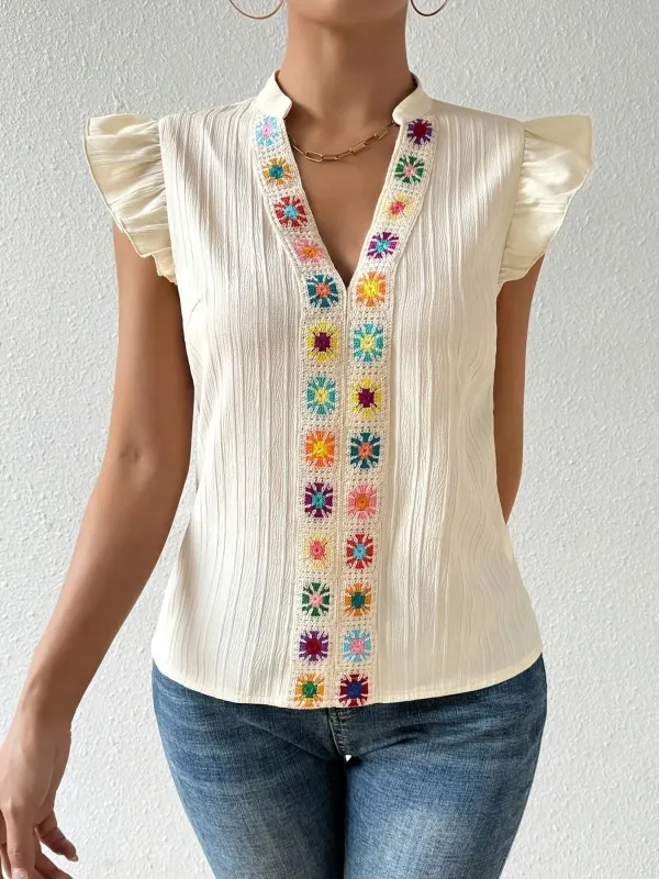 Embroidered Cap Sleeve Notched Blouse sold by Charming Charlie