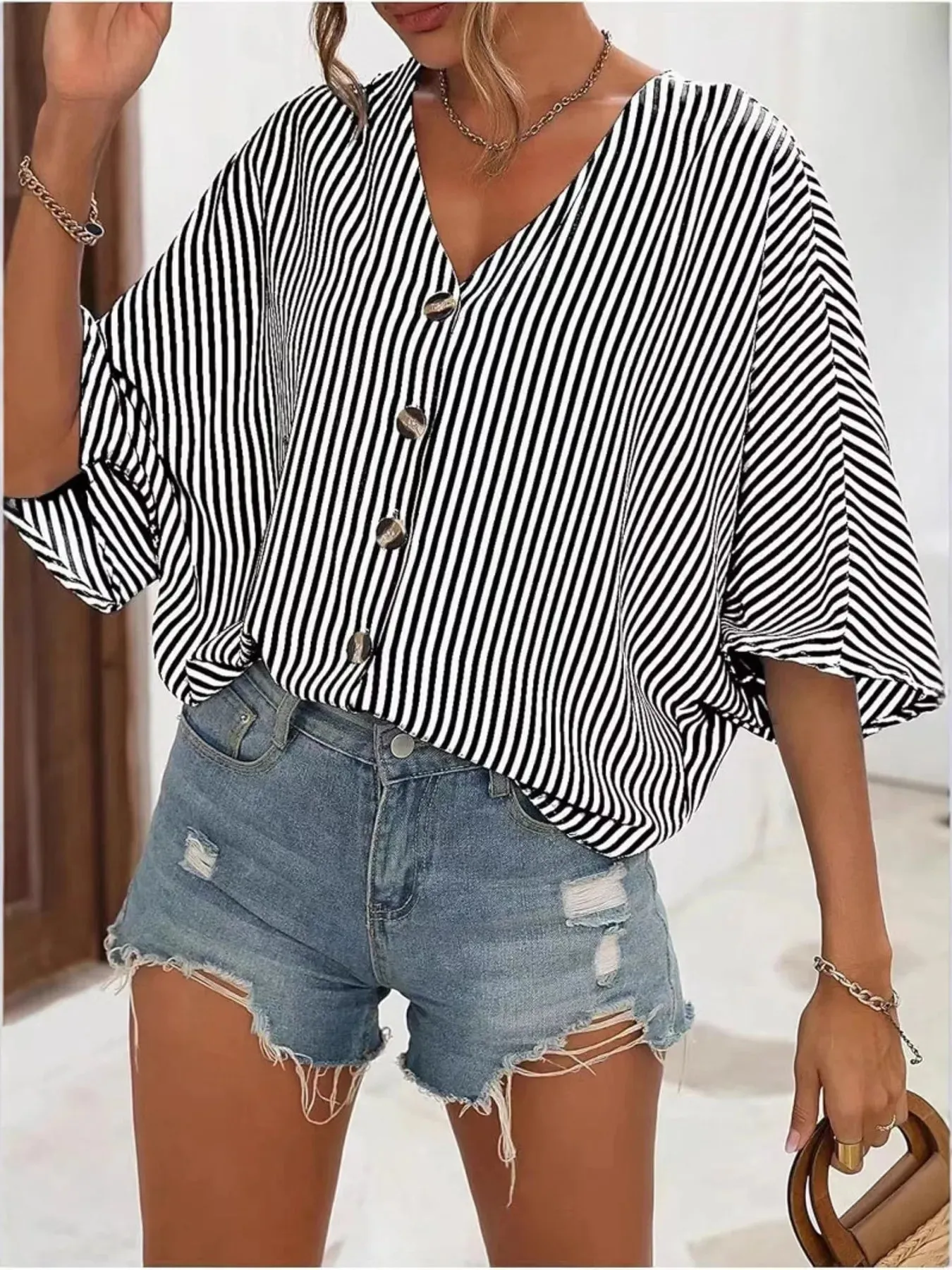 V-Neck Striped Batwing Sleeve Casual Blouse sold by Charming Charlie