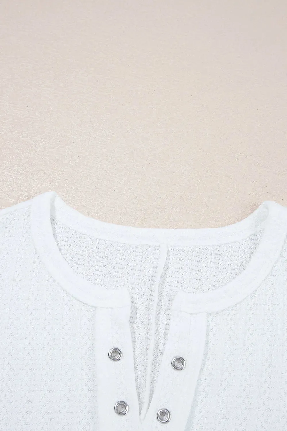 Textured Hollow Grommet Placket Split Neck Short Sleeve Top sold by Charming Charlie product image thumbnail 5