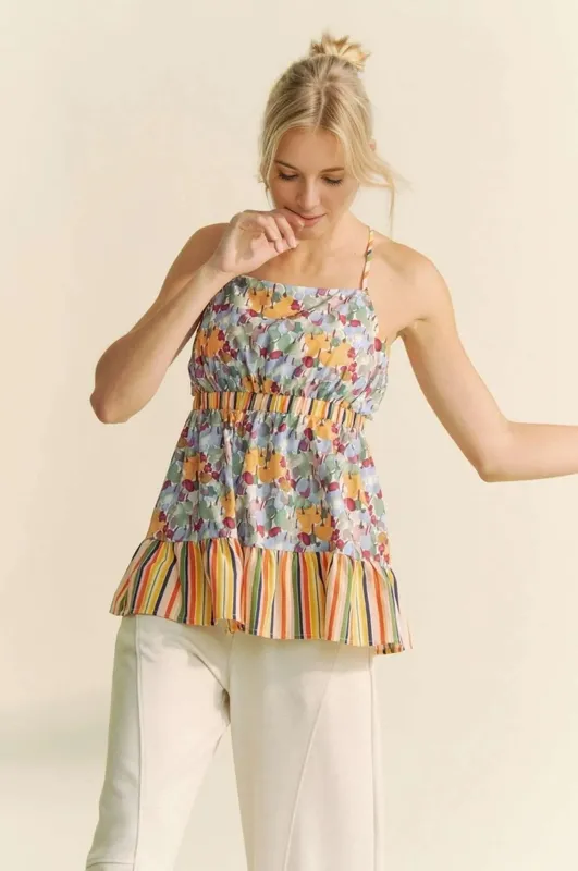 Davi & Dani Floral Smocked Sleeveless Ruffle Back Tie Top sold by Charming Charlie
