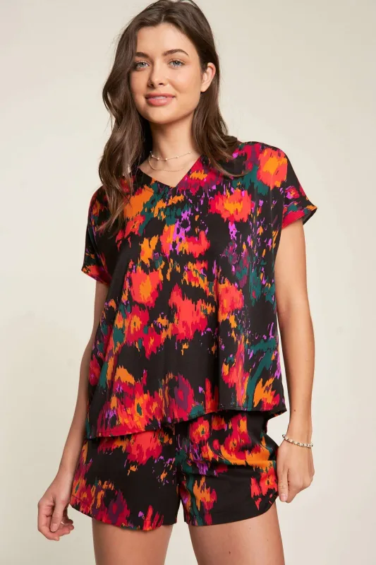 Davi & Dani Printed V Neck Short Sleeve Top and Shorts Set sold by Charming Charlie