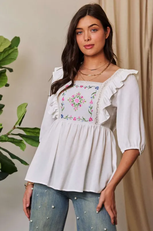 Davi & Dani Texture Tie Back Floral Embroidery Frill Blouse sold by Charming Charlie