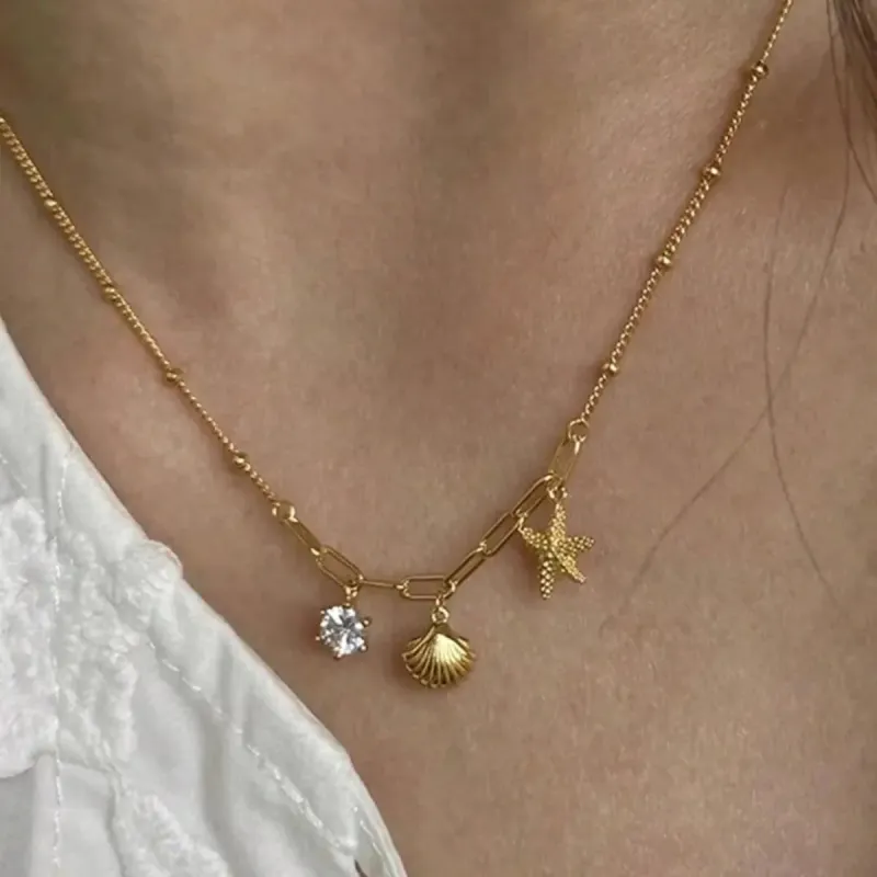 18K Gold-Plated Zircon Shell Necklace sold by Charming Charlie