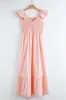 Apricot Pink V Neck Flutter Sleeve Smocked Bodice sold by Charming Charlie