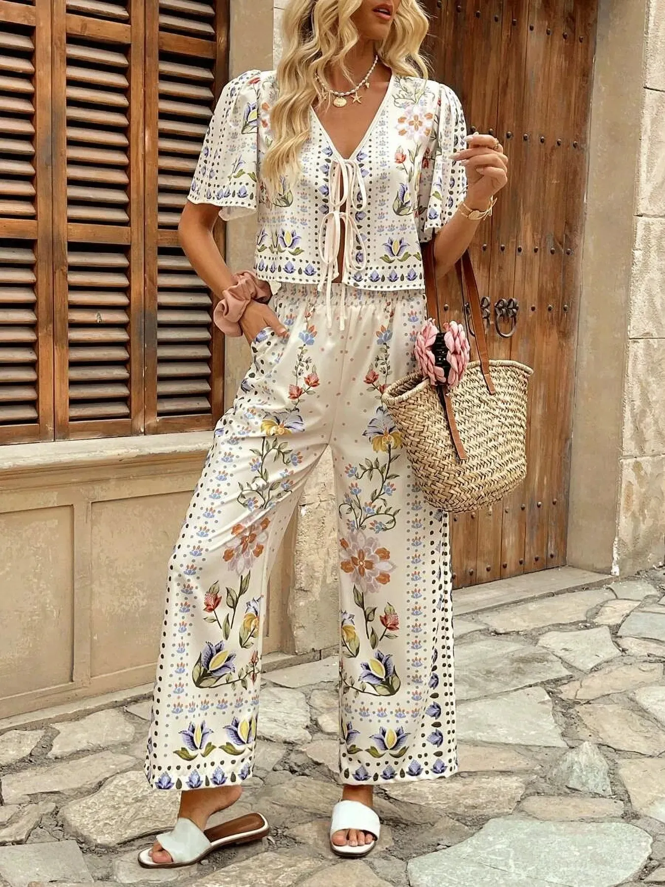 Printed Tie Front Short Sleeve Top and Pants Set sold by Charming Charlie