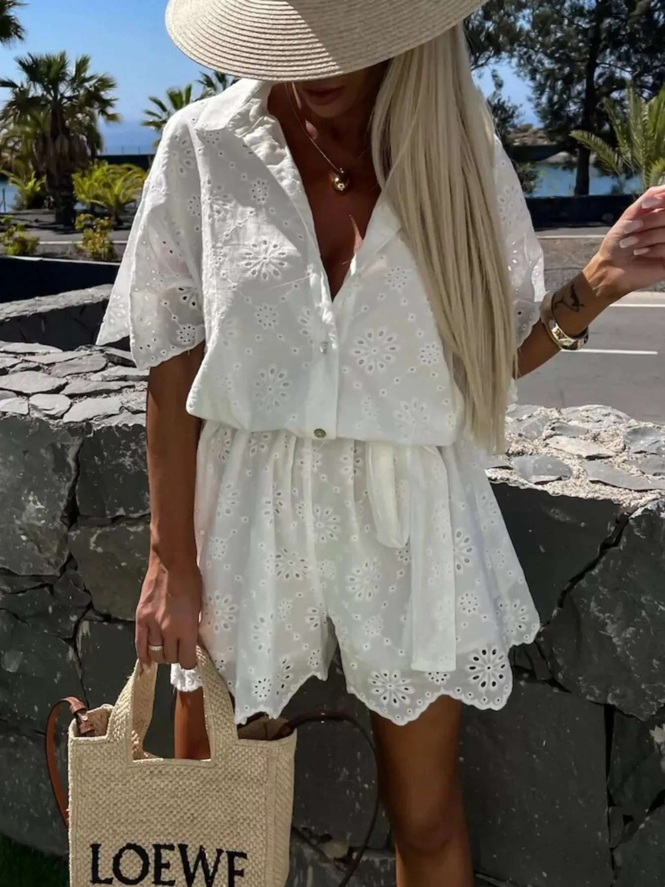 Eyelet Lace Button-Up Romper sold by Charming Charlie product image thumbnail 5