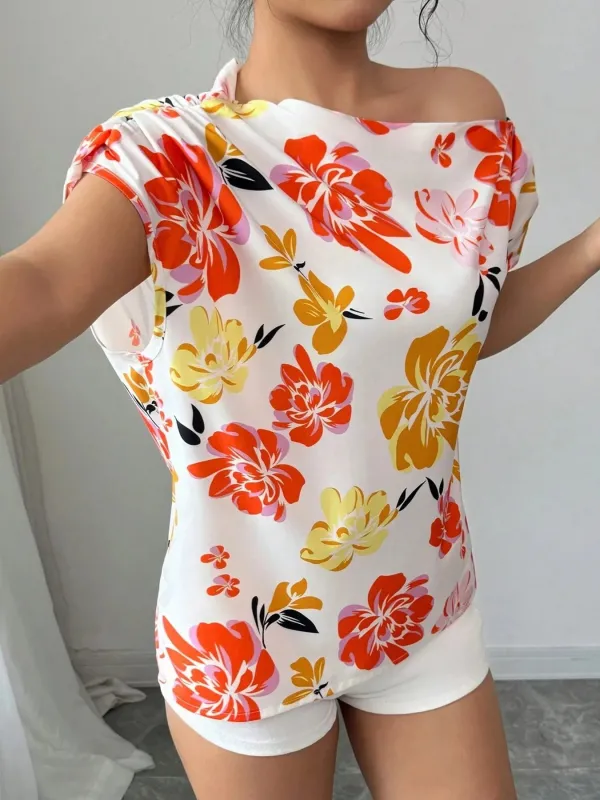 Floral Print One Shoulder Short Sleeve Blouse sold by Charming Charlie