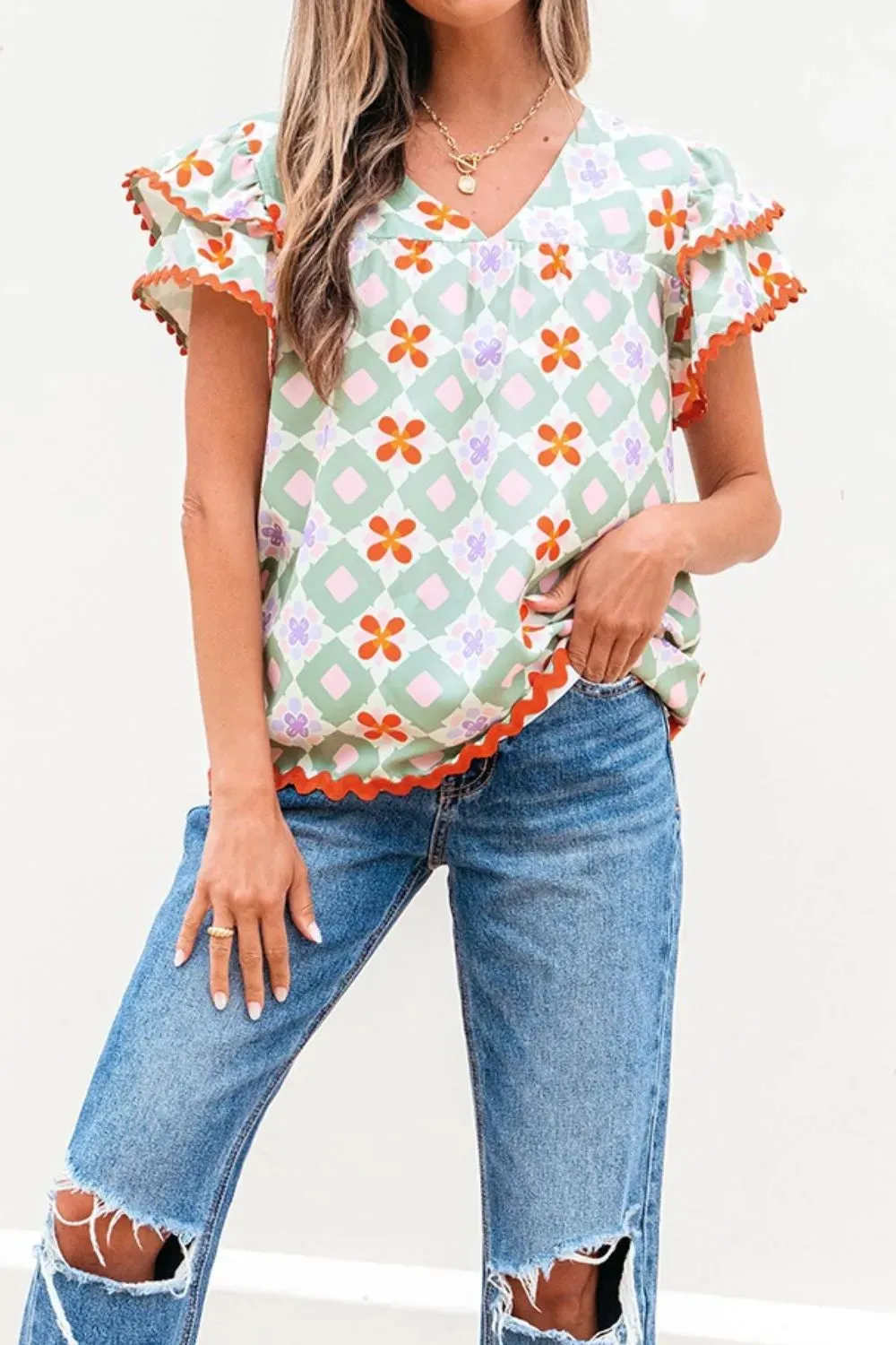 Floral Print V-neck Flutter Sleeve Blouse sold by Charming Charlie product image thumbnail 4