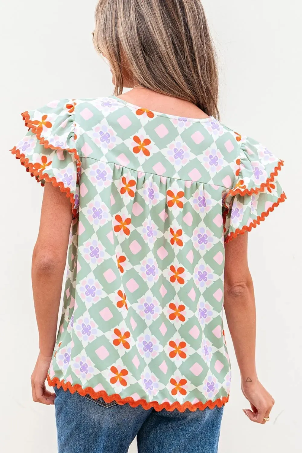 Floral Print V-neck Flutter Sleeve Blouse sold by Charming Charlie product image thumbnail 3