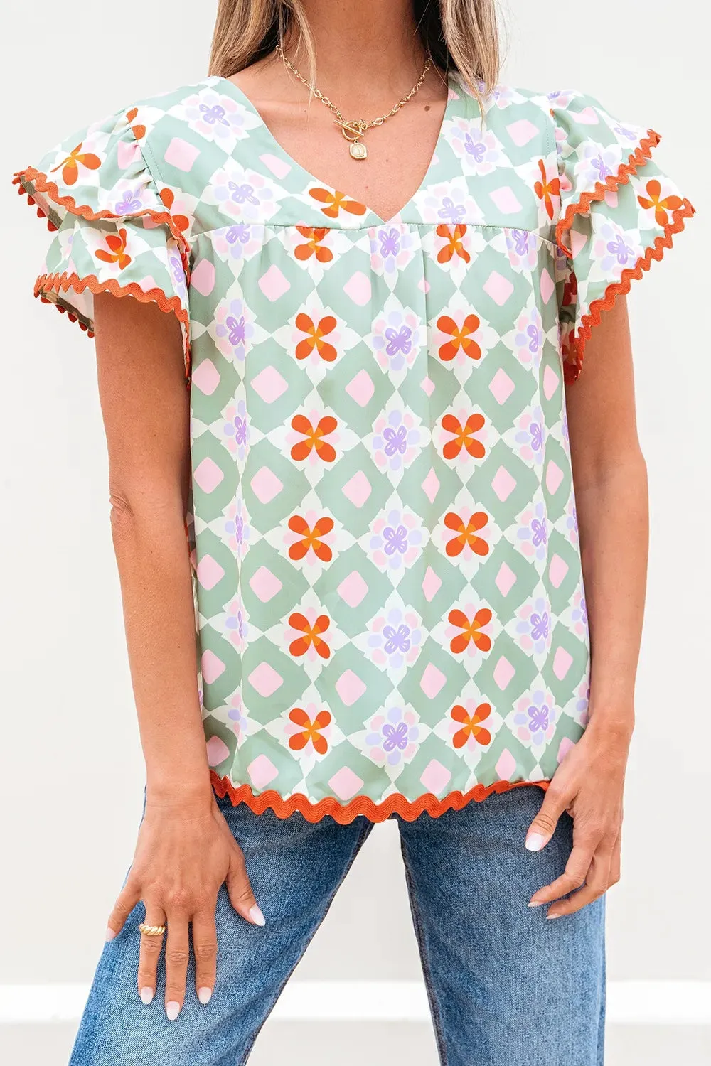 Floral Print V-neck Flutter Sleeve Blouse sold by Charming Charlie product image thumbnail 2