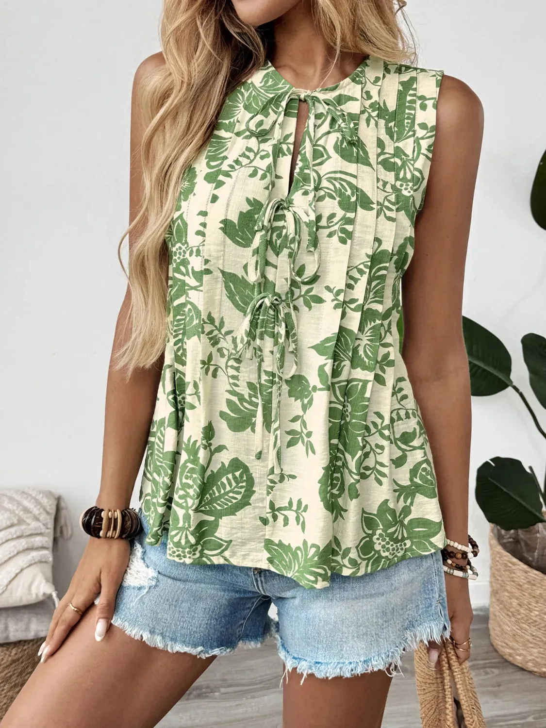Printed Sleeveless Ruffle Peplum Blouse sold by Charming Charlie product image thumbnail 3