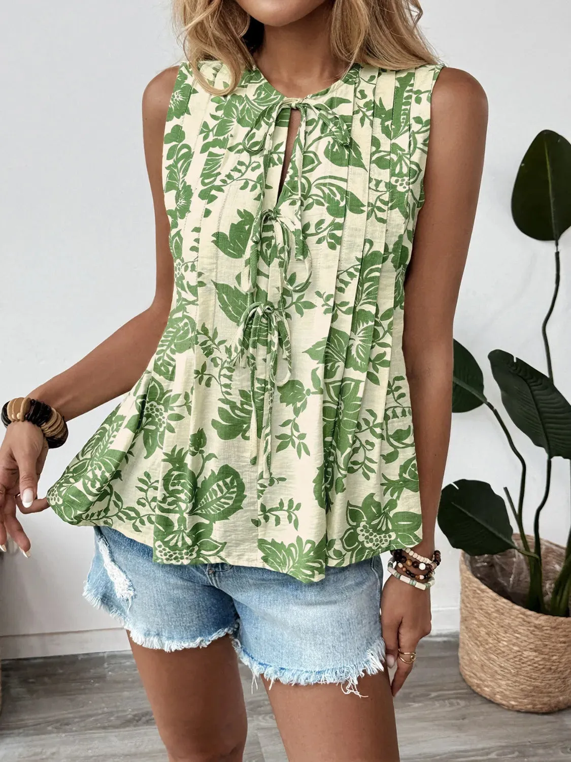 Printed Sleeveless Ruffle Peplum Blouse sold by Charming Charlie product image thumbnail 2