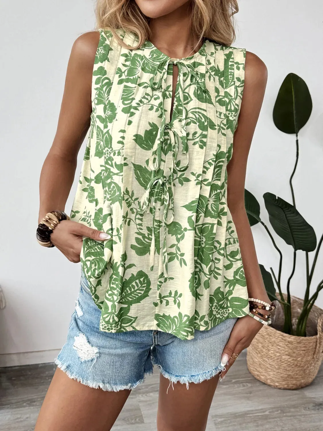 Printed Sleeveless Ruffle Peplum Blouse sold by Charming Charlie product image thumbnail 4