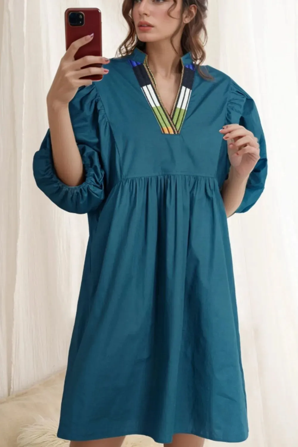 Loose Fit Puff Sleeve Mini Dress sold by Charming Charlie