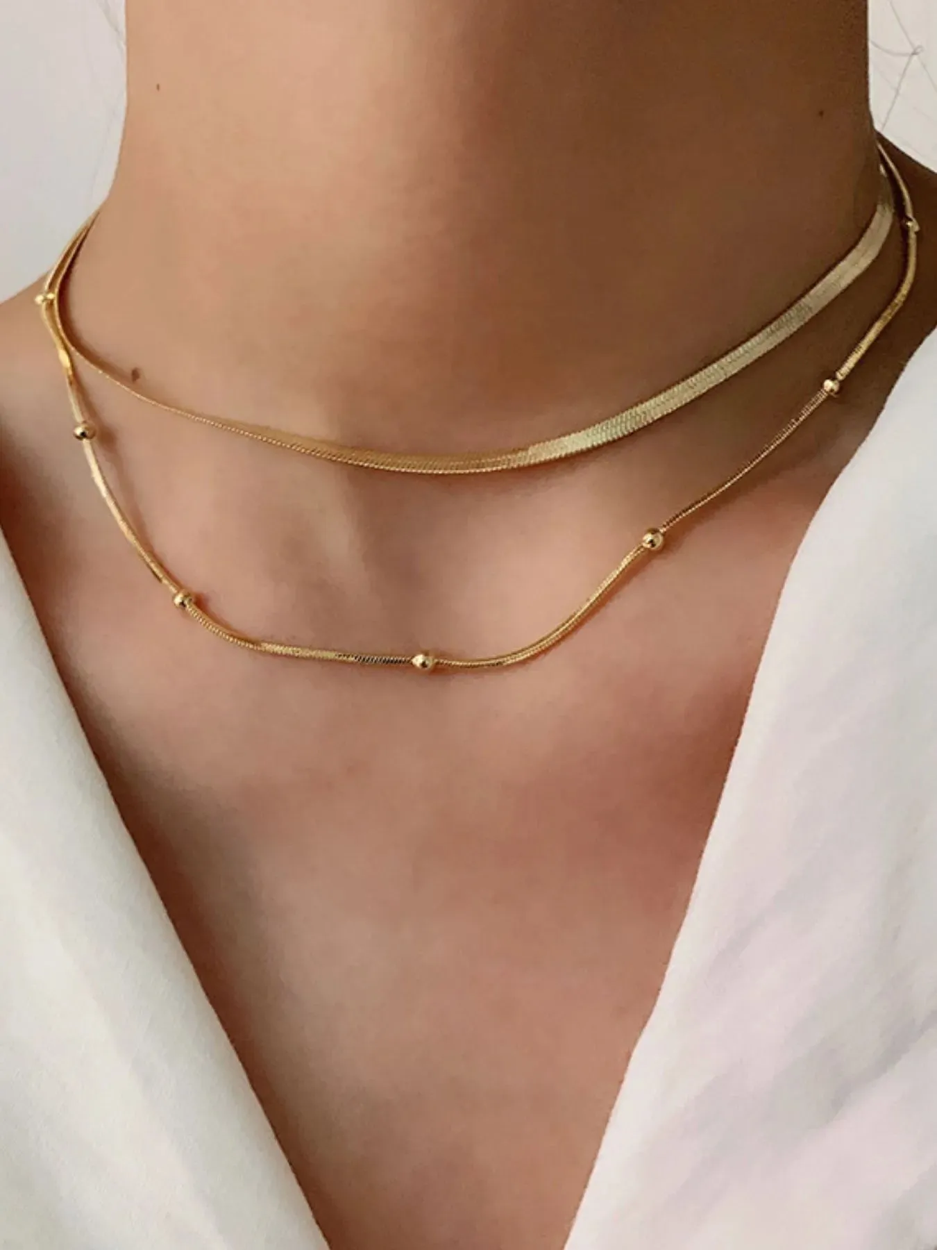 18K Gold-Plated Stainless Steel Layered Snake Chain Necklace sold by Charming Charlie