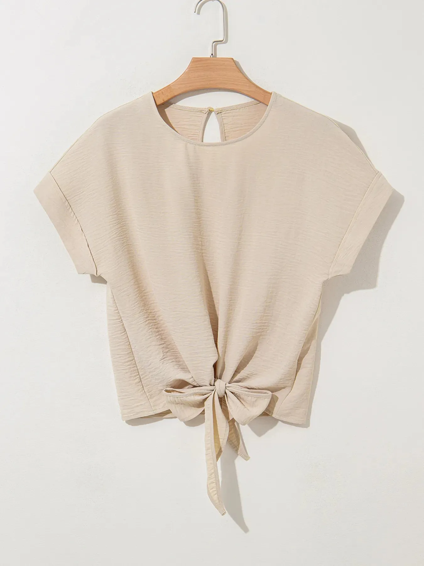 Solid Color Knotted Hem Short Sleeve Blouse sold by Charming Charlie product image thumbnail 5