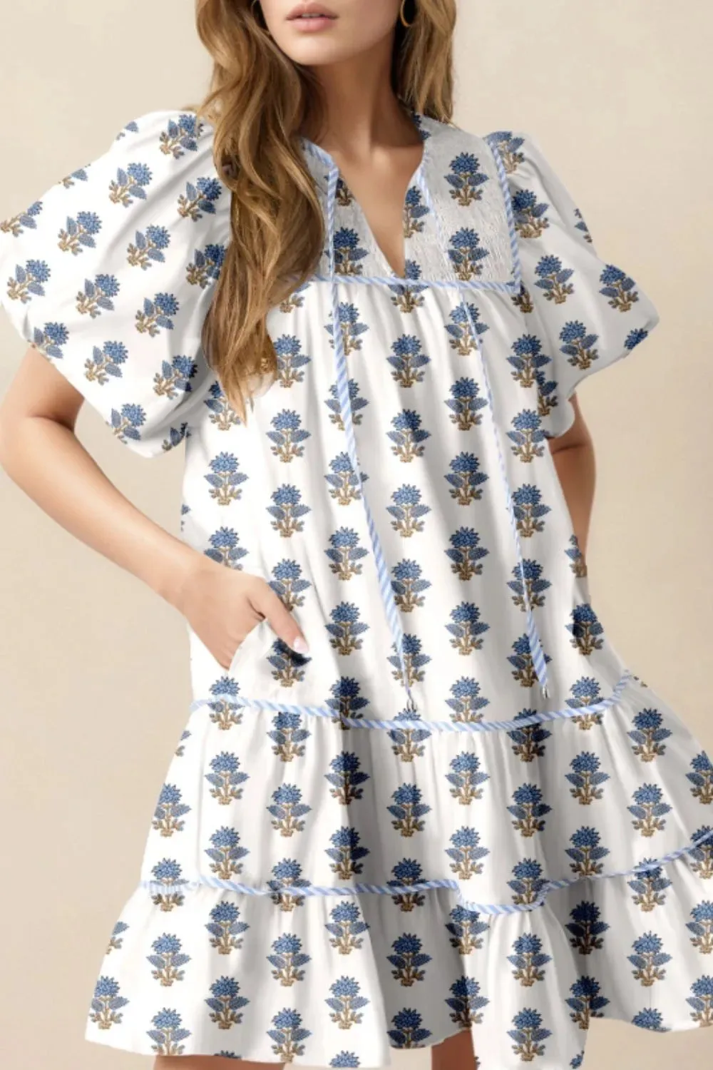 Floral Puff Sleeve Mini Dress with Pockets sold by Charming Charlie
