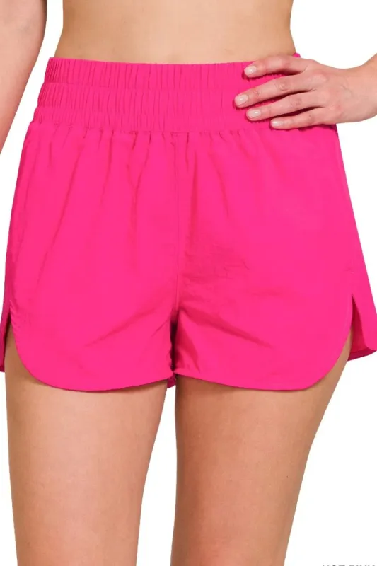 Zenana Windbreaker Smocked Waistband Running Shorts sold by Charming Charlie