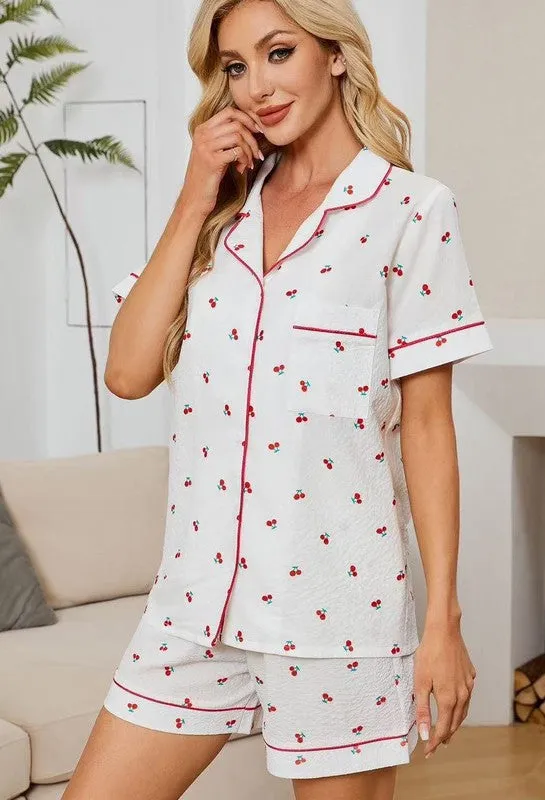 Two piece cherry shorts pajama set sold by Charming Charlie