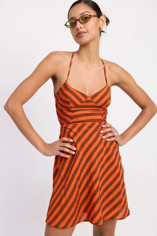 STRAPPY BACK BIAS CUT MINI DRESS sold by Charming Charlie