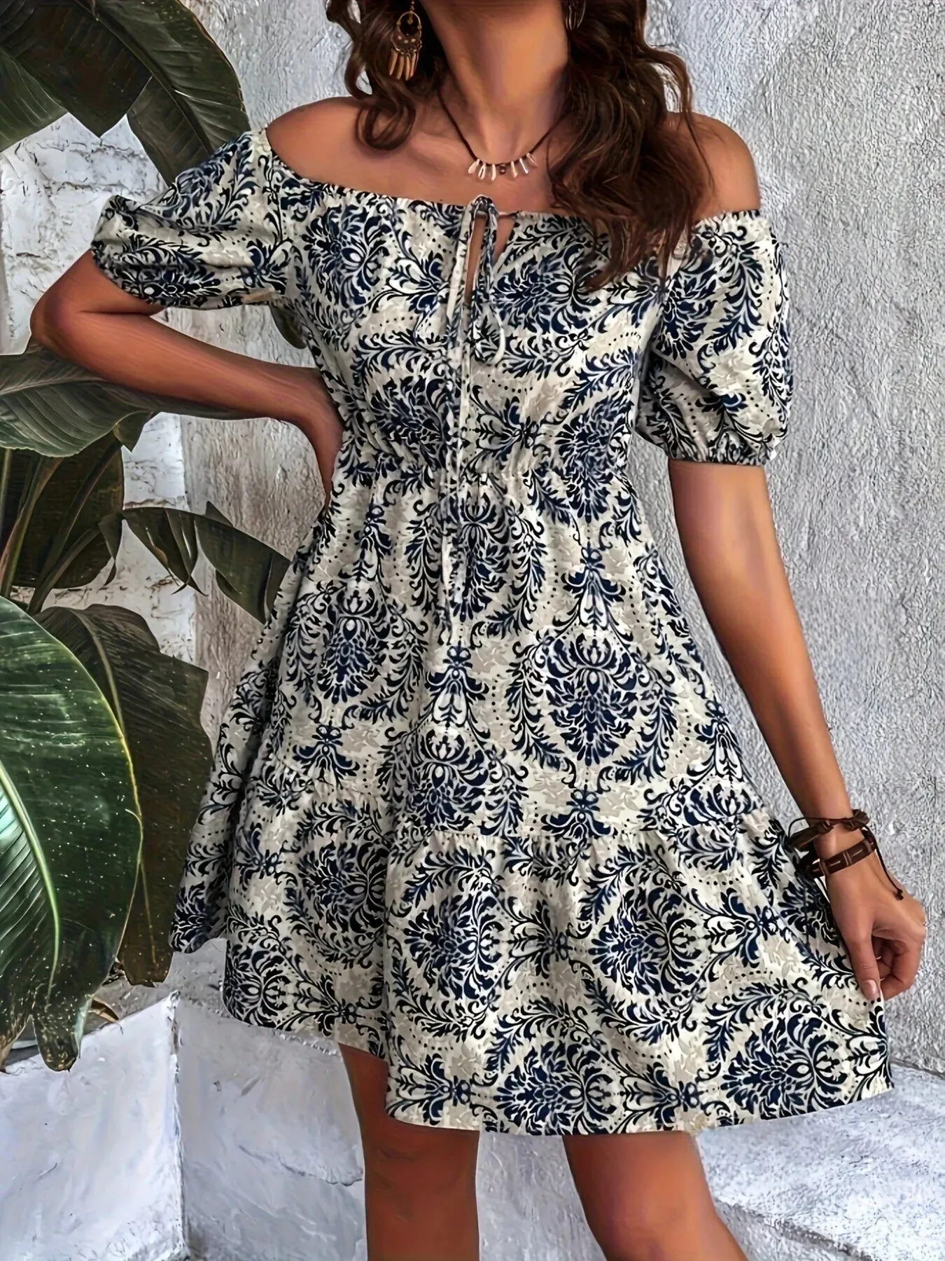 Off-Shoulder Printed Smocked Mini Dress sold by Charming Charlie