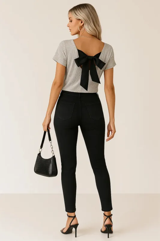 Back Bow Tie Ribbed Knit Top sold by Charming Charlie