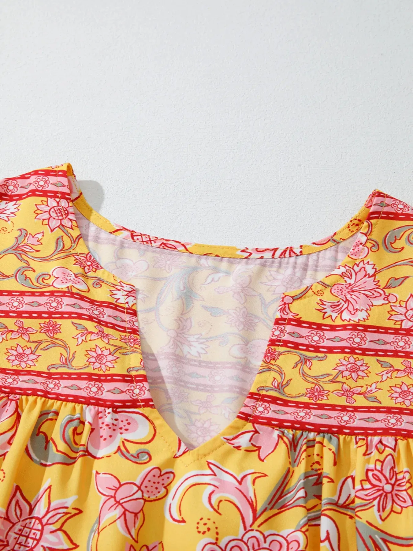 Floral Notched Neck Ruffled Sleeve Casual Blouse sold by Charming Charlie product image thumbnail 5