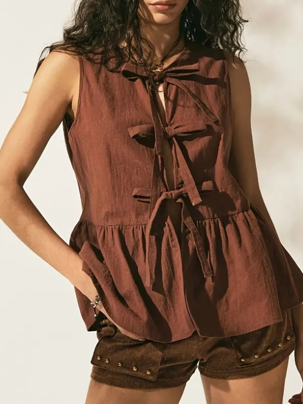 Bow-Tie Peplum Tank Top sold by Charming Charlie