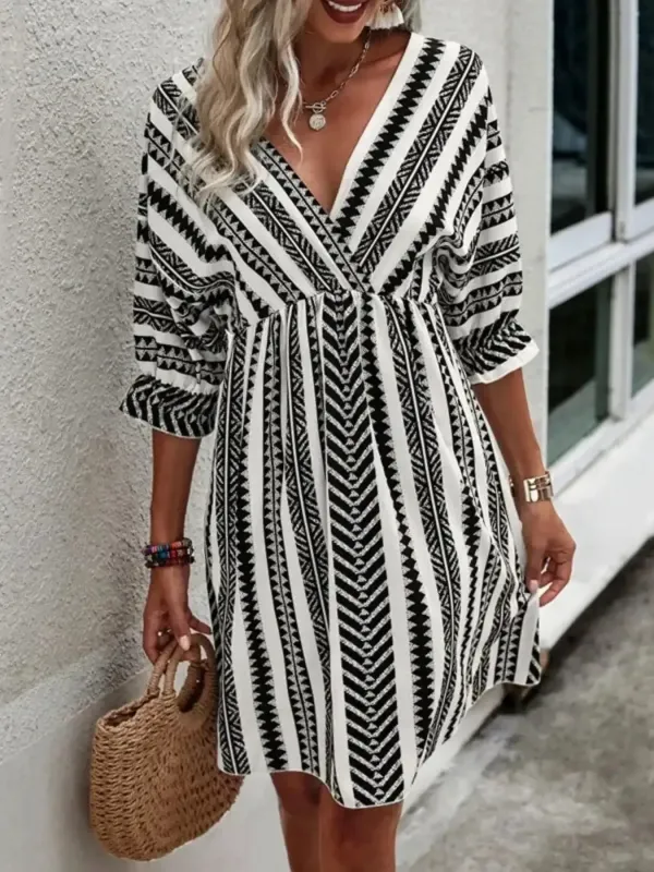Geometric Print V-Neck Mini Dress sold by Charming Charlie