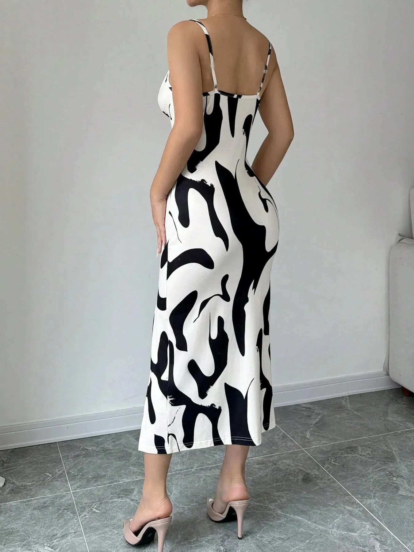Slit Cow Print Spaghetti Strap Midi Dress sold by Charming Charlie product image thumbnail 2