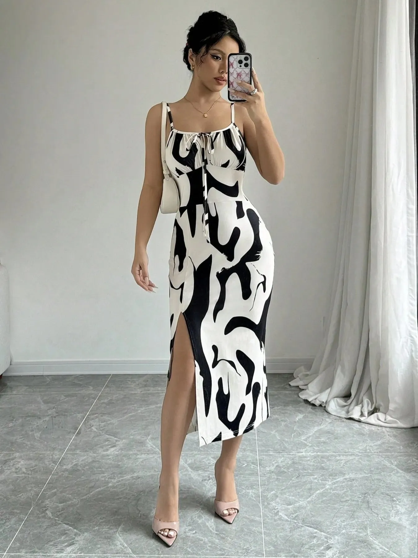 Slit Cow Print Spaghetti Strap Midi Dress sold by Charming Charlie product image thumbnail 5