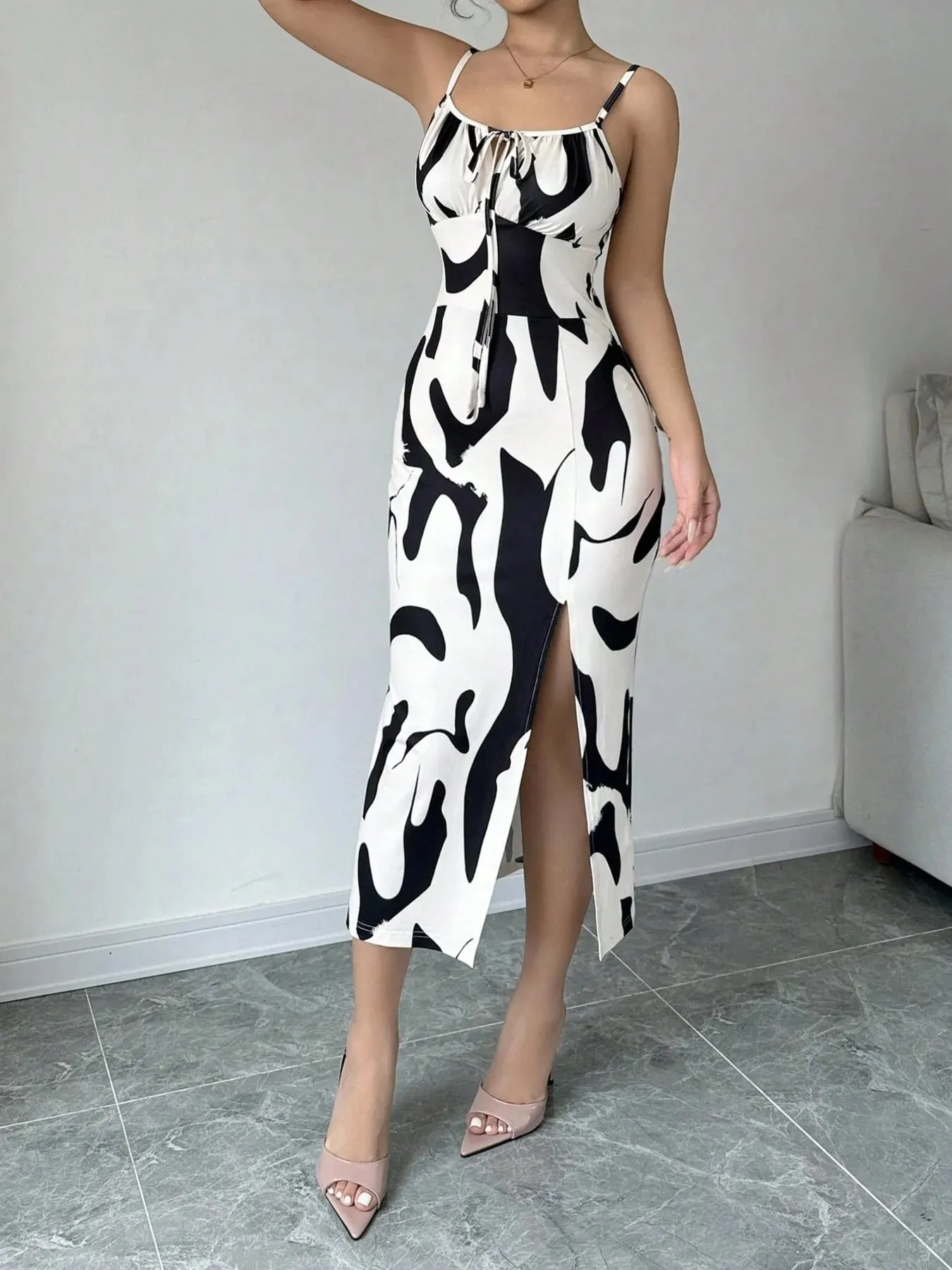 Slit Cow Print Spaghetti Strap Midi Dress sold by Charming Charlie product image thumbnail 3