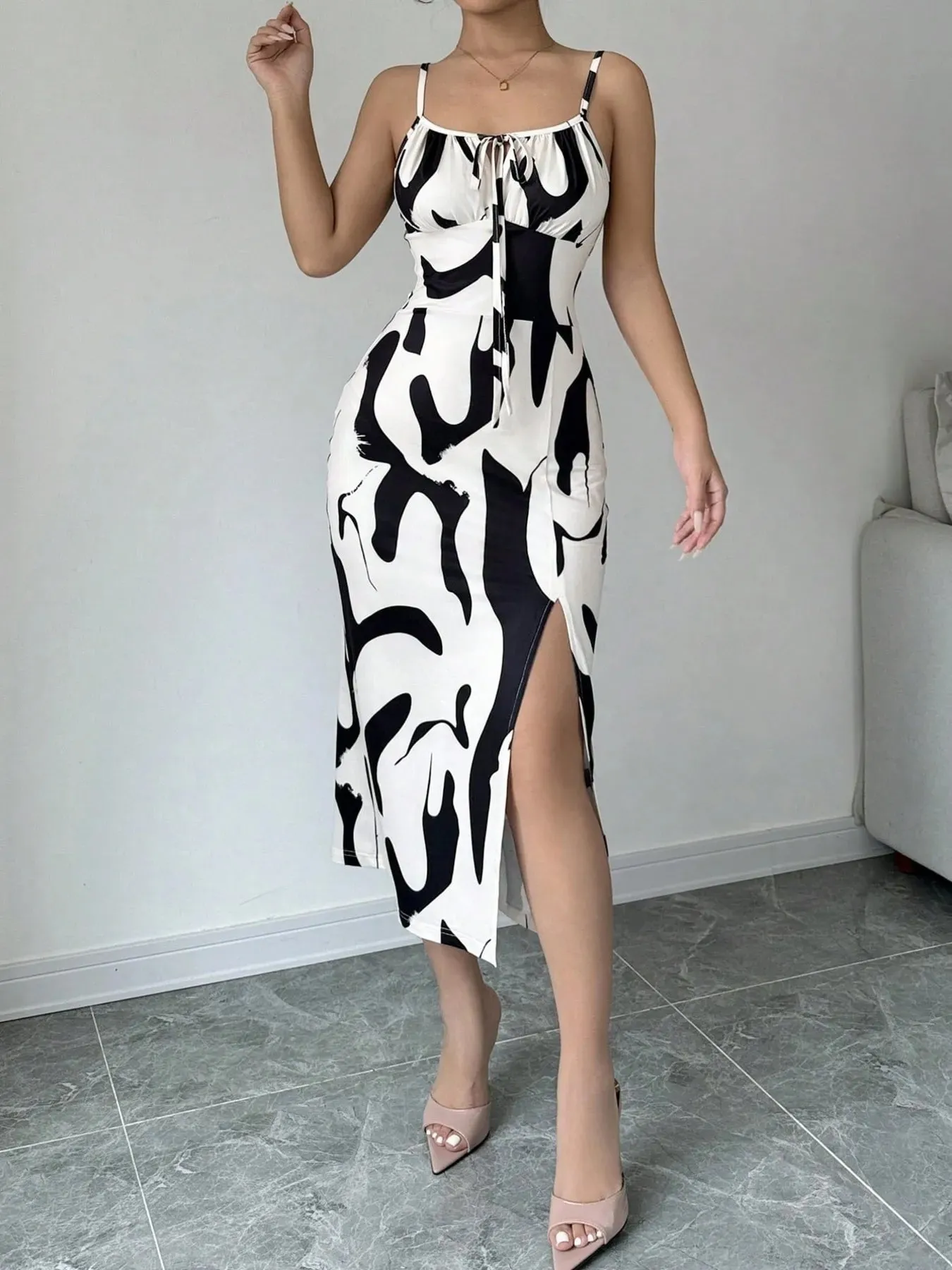 Slit Cow Print Spaghetti Strap Midi Dress sold by Charming Charlie