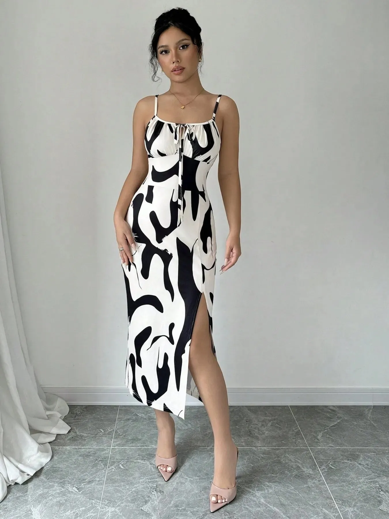 Slit Cow Print Spaghetti Strap Midi Dress sold by Charming Charlie product image thumbnail 4