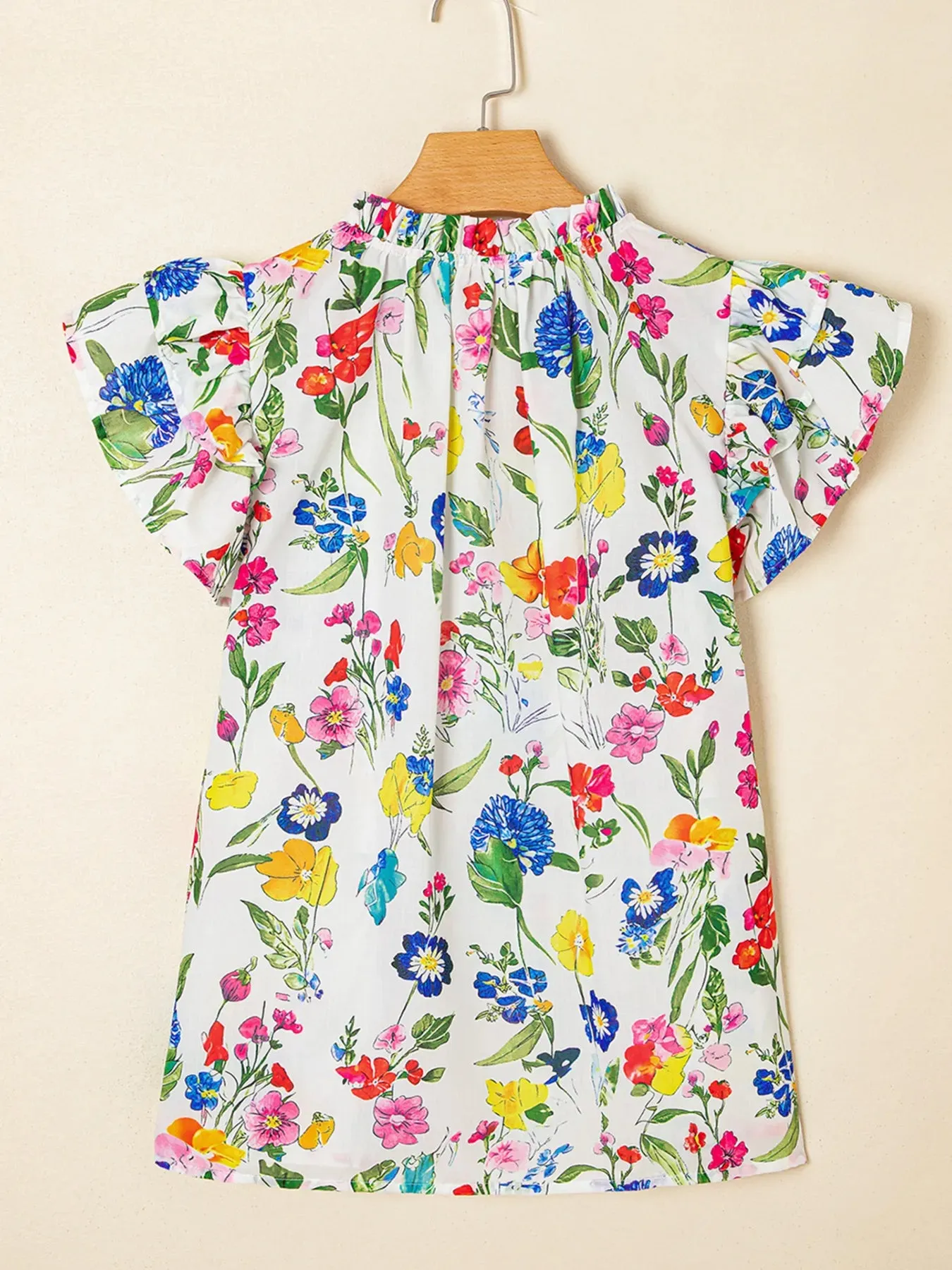 Floral Print Ruffle Layered Short Sleeve Blouse sold by Charming Charlie product image thumbnail 4