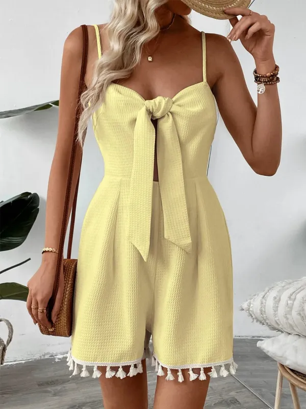 Tie-Front Textured Romper with Tassel Hem sold by Charming Charlie
