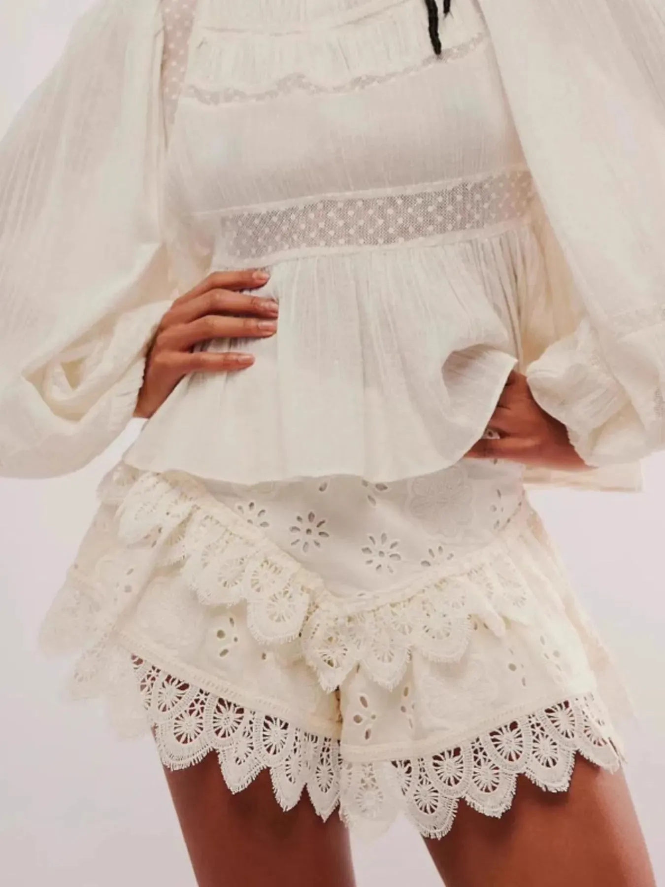 Lace Eyelet Ruffle Hem Shorts sold by Charming Charlie product image thumbnail 2