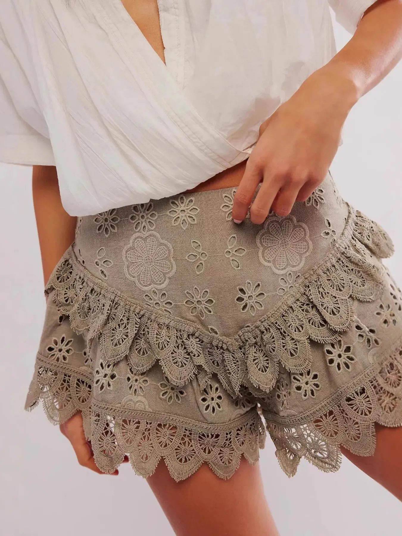 Lace Eyelet Ruffle Hem Shorts sold by Charming Charlie product image thumbnail 4