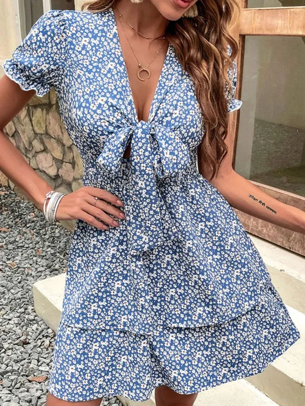 Floral Print Tie-Front Mini Dress with Flutter Sleeves sold by Charming Charlie