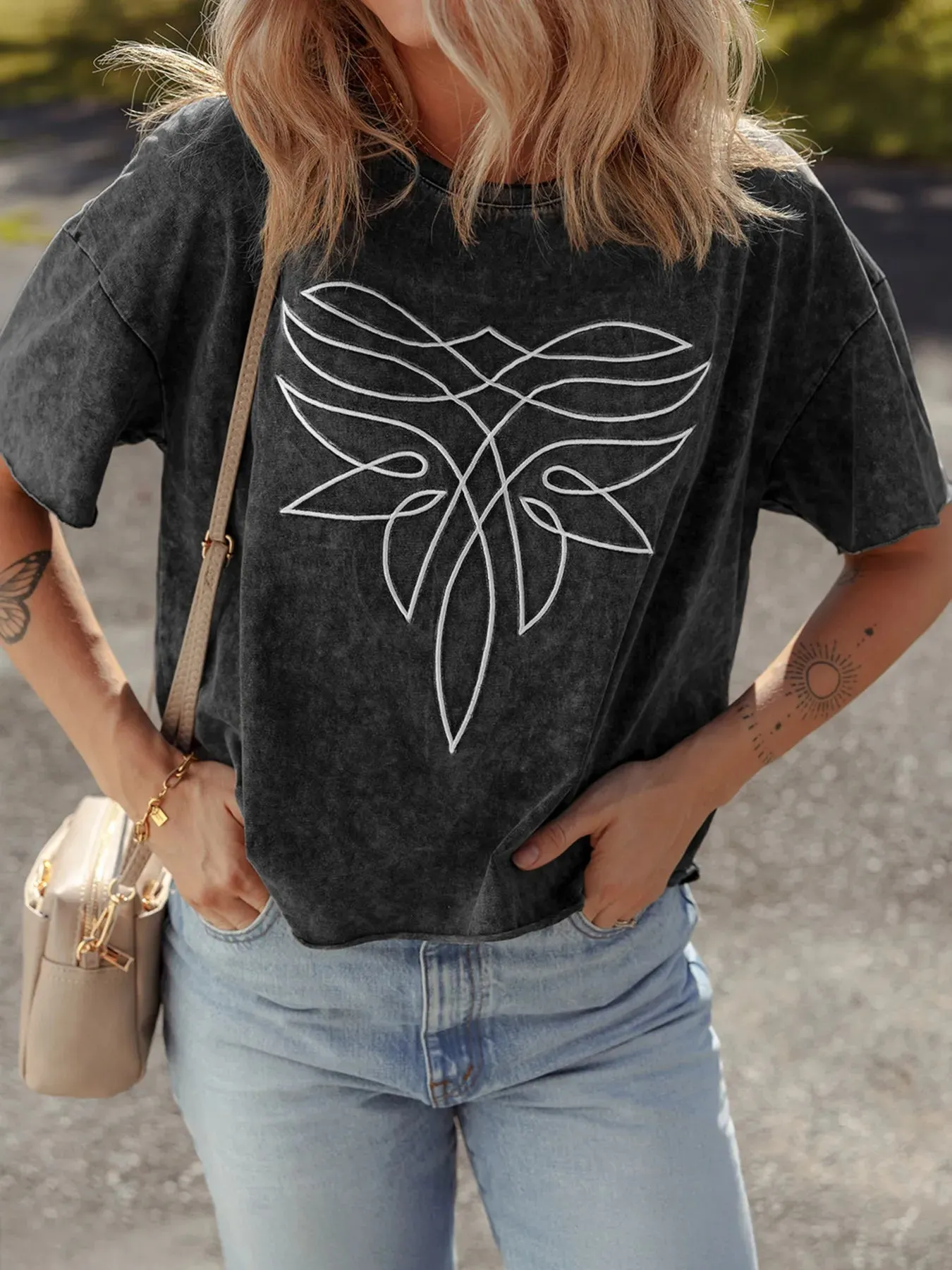 Floral Embroidered Mineral Wash Crew Neck T Shirt sold by Charming Charlie