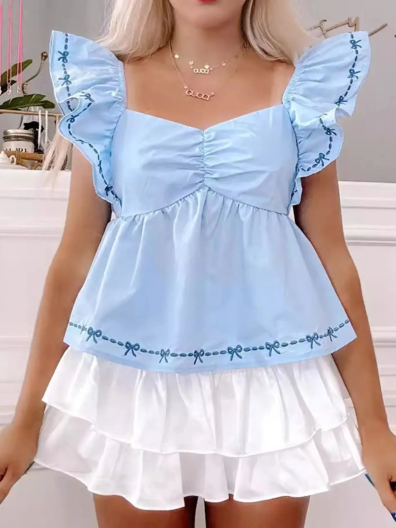 Ruffled Sweetheart Neck Peplum Blouse sold by Charming Charlie product image thumbnail 4