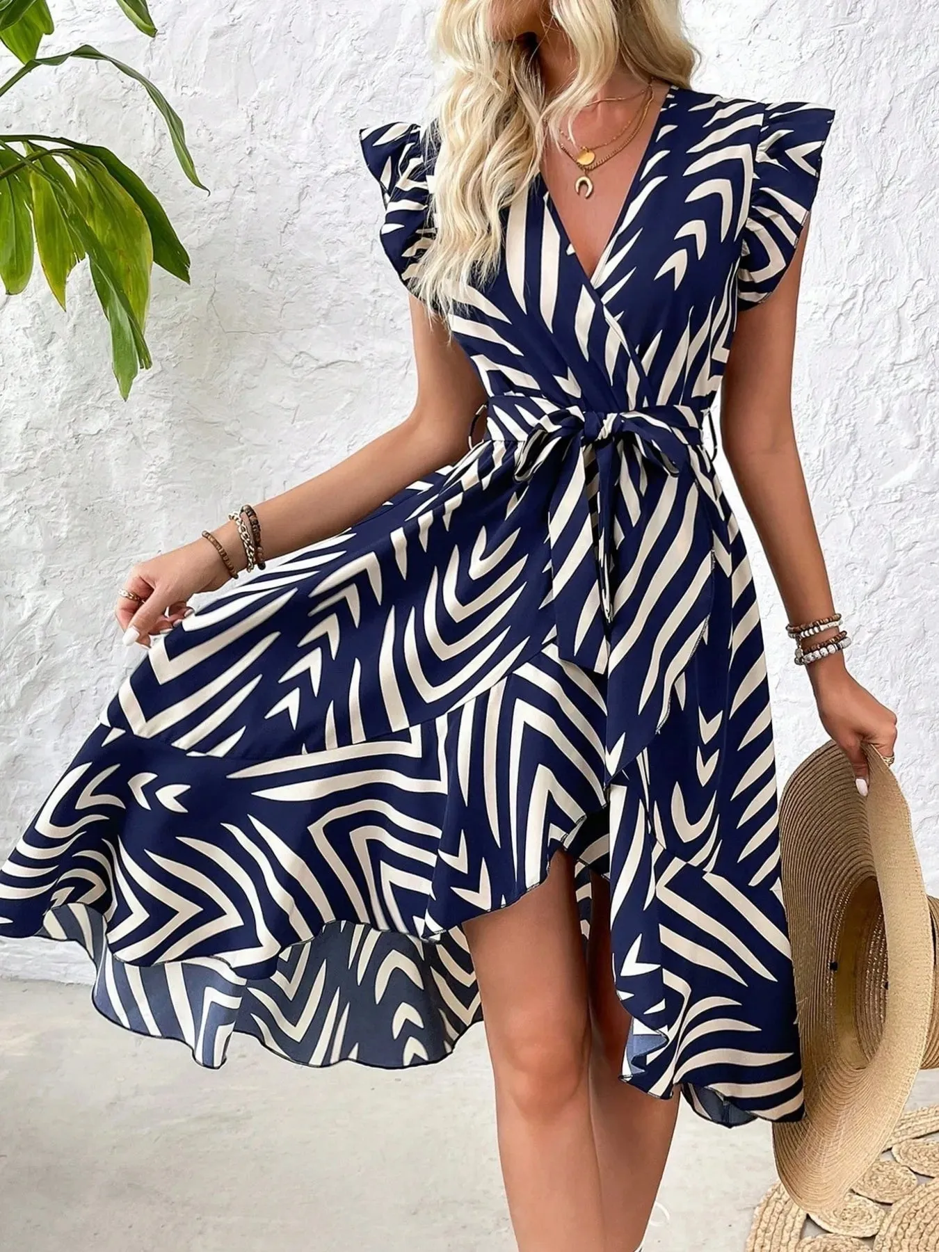 Geometric Print Surplice Flutter Sleeve Dress sold by Charming Charlie product image thumbnail 4