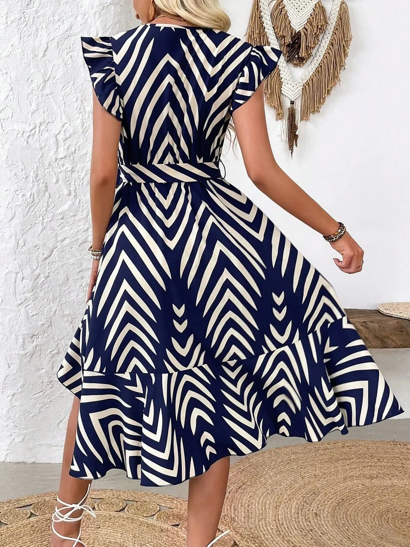Geometric Print Surplice Flutter Sleeve Dress sold by Charming Charlie product image thumbnail 2